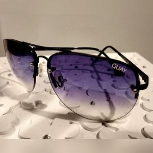 Quay Aviator Sunglasses. Gradient fade lens and metal arms.